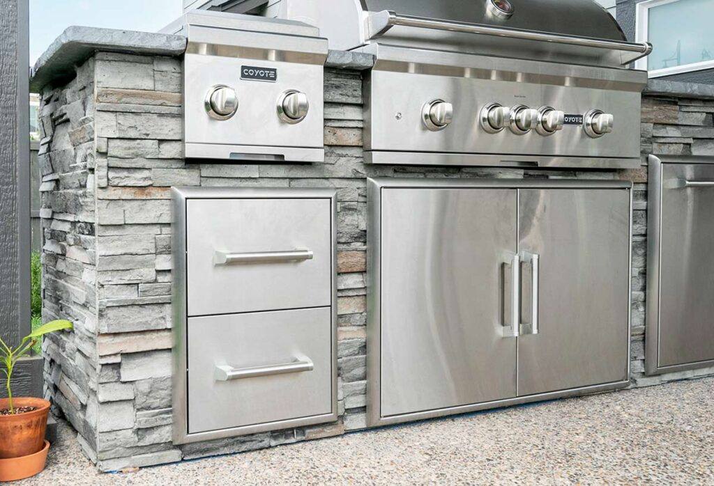 Custom outdoor kitchen with built-in grill and countertops